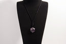 Raw Earth Crystals amethyst geometric pendant necklace made with natural crystal for spiritual growth, calmness, and enhanced intuition.