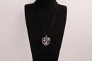Raw Earth Crystals amethyst heart pendant with an elegant rose design, featuring a deep purple amethyst stone and a silver-tone vine with leaves, promoting spiritual growth, intuition, and inner peace.