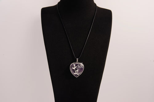 Raw Earth Crystals amethyst heart pendant with an elegant rose design, featuring a deep purple amethyst stone and a silver-tone vine with leaves, promoting spiritual growth, intuition, and inner peace.