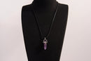 Raw Earth Crystals amethyst necklace with a pointed natural stone pendant, designed to enhance spiritual awareness, promote calmness, and support intuition.