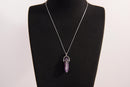 Raw Earth Crystals amethyst necklace with a pointed natural stone pendant, designed to enhance spiritual awareness, promote calmness, and support intuition.