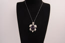 Raw Earth Crystals amethyst turtle necklace made from natural crystal to enhance spiritual awareness, calm the mind, and promote inner peace.