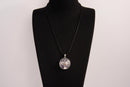 Raw Earth Crystals amethyst pendant featuring a tree of life design, crafted with natural crystal for spiritual awareness, calmness, and protection.