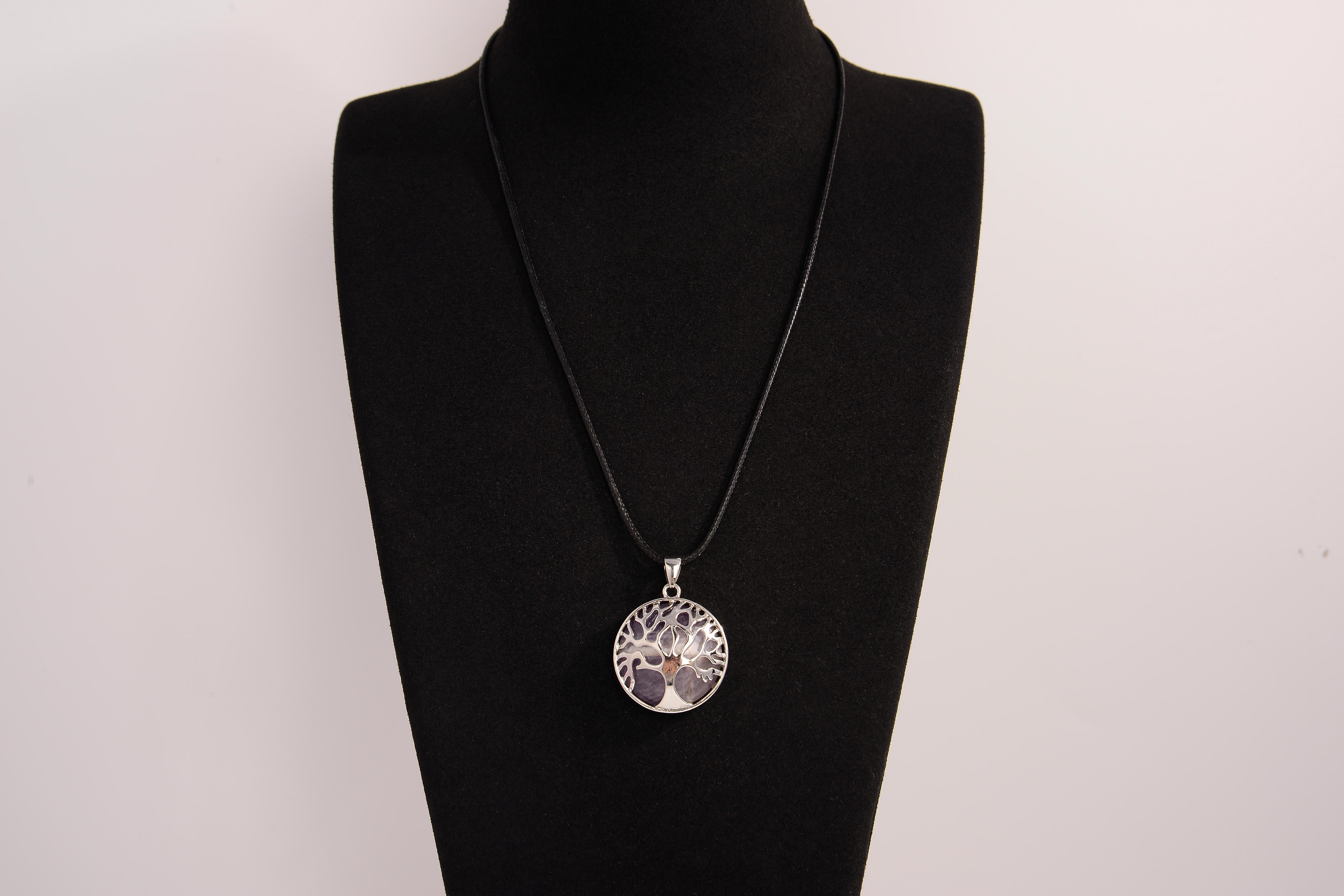 Raw Earth Crystals amethyst pendant featuring a tree of life design, crafted with natural crystal for spiritual awareness, calmness, and protection.