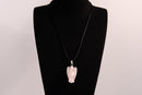 Raw Earth Crystals angel pendant crafted from rose quartz, featuring a delicate sculpted design to promote love, compassion, and emotional healing.