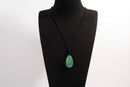 Raw Earth Crystals aventurine teardrop pendant on black cord, made from natural aventurine stone, promoting luck, prosperity, and emotional balance.