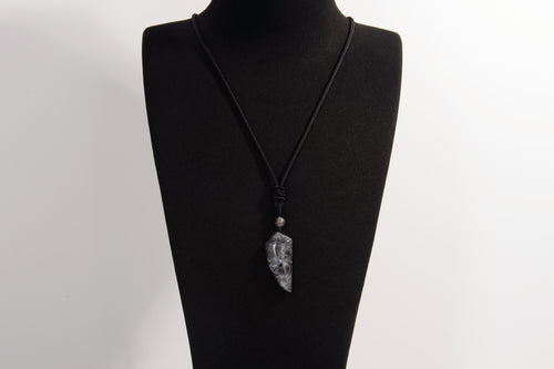 Raw Earth Crystals black labradorite point pendant necklace featuring natural crystal jewelry designed for intuition, spiritual insight, and inner strength.