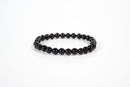 Black obsidian beaded bracelet from Raw Earth Crystals, featuring natural gemstones for protection, grounding, and spiritual clarity.