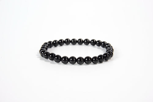 Black obsidian beaded bracelet from Raw Earth Crystals, featuring natural gemstones for protection, grounding, and spiritual clarity.