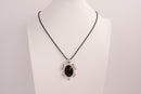 Raw Earth Crystals black obsidian turtle necklace made from natural crystal to offer grounding, protection, and emotional stability.