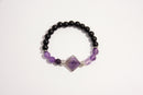 Raw Earth Crystals black onyx and amethyst bracelet with silver accent, crafted from natural crystals, promotes spiritual awareness, calmness, and emotional balance.