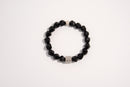 Raw Earth Crystals black onyx faceted bracelet with silver accent, crafted from natural crystal, promotes strength, protection, and emotional balance.
