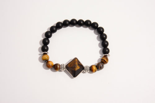 Raw Earth Crystals black onyx and tiger eye bracelet with silver accent, crafted from natural crystals, promotes confidence, protection, and inner strength.