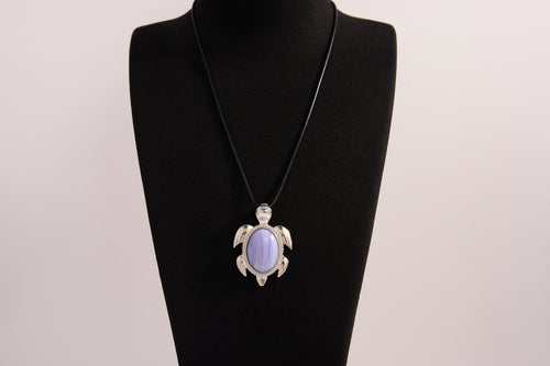 Raw Earth Crystals blue agate turtle necklace made from natural crystal to promote peace, emotional balance, and soothing energy.