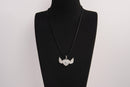 Raw Earth Crystals clear quartz heart with wings necklace, featuring a luminous heart-shaped stone adorned with angelic wings, designed to amplify energy, enhance clarity, and offer spiritual protection.