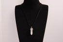Raw Earth Crystals clear quartz necklace with a pointed natural stone pendant, designed to enhance clarity, amplify energy, and support spiritual awareness.