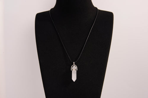 Raw Earth Crystals clear quartz necklace with a pointed natural stone pendant, designed to enhance clarity, amplify energy, and support spiritual awareness.