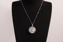 Raw Earth Crystals clear quartz pendant featuring a tree of life design, crafted with natural crystal for clarity, energy amplification, and balance.