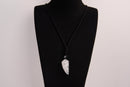 Raw Earth Crystals clear quartz point pendant necklace featuring natural crystal jewelry designed for clarity, amplification, and spiritual connection.