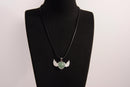 Raw Earth Crystals green aventurine heart with wings necklace, featuring a vibrant green heart-shaped stone adorned with delicate angelic wings, designed to promote abundance, emotional balance, and spiritual growth.