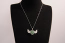 Raw Earth Crystals green aventurine heart with wings necklace, featuring a vibrant green heart-shaped stone adorned with delicate angelic wings, designed to promote abundance, emotional balance, and spiritual growth.