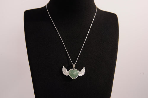 Raw Earth Crystals green aventurine heart with wings necklace, featuring a vibrant green heart-shaped stone adorned with delicate angelic wings, designed to promote abundance, emotional balance, and spiritual growth.