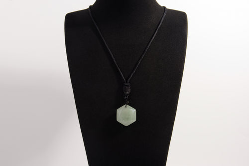 Raw Earth Crystals green aventurine necklace with a faceted natural stone pendant, designed to enhance emotional balance, promote calmness, and support personal growth.