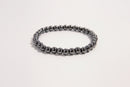 Hematite beaded bracelet from Raw Earth Crystals, featuring natural gemstones for grounding, mental clarity, and protective energy.
