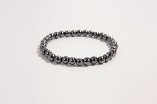 Hematite beaded bracelet from Raw Earth Crystals, featuring natural gemstones for grounding, mental clarity, and protective energy.