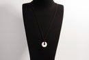 Raw Earth Crystals howlite disc pendant necklace made with natural crystal for calmness, patience, and emotional balance.