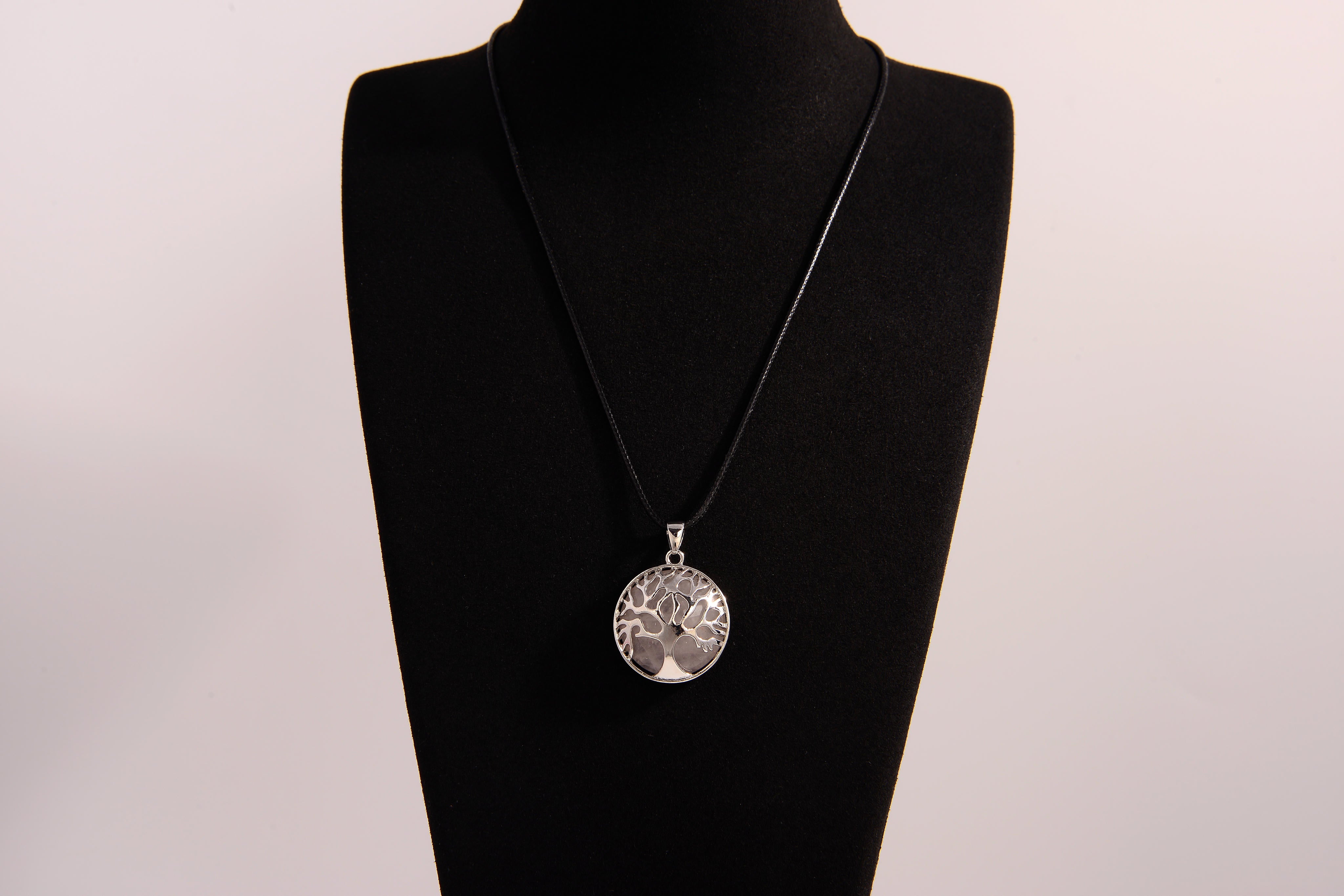 Raw Earth Crystals labradorite pendant featuring a tree of life design, crafted with natural crystal for protection, intuition, and inner strength.