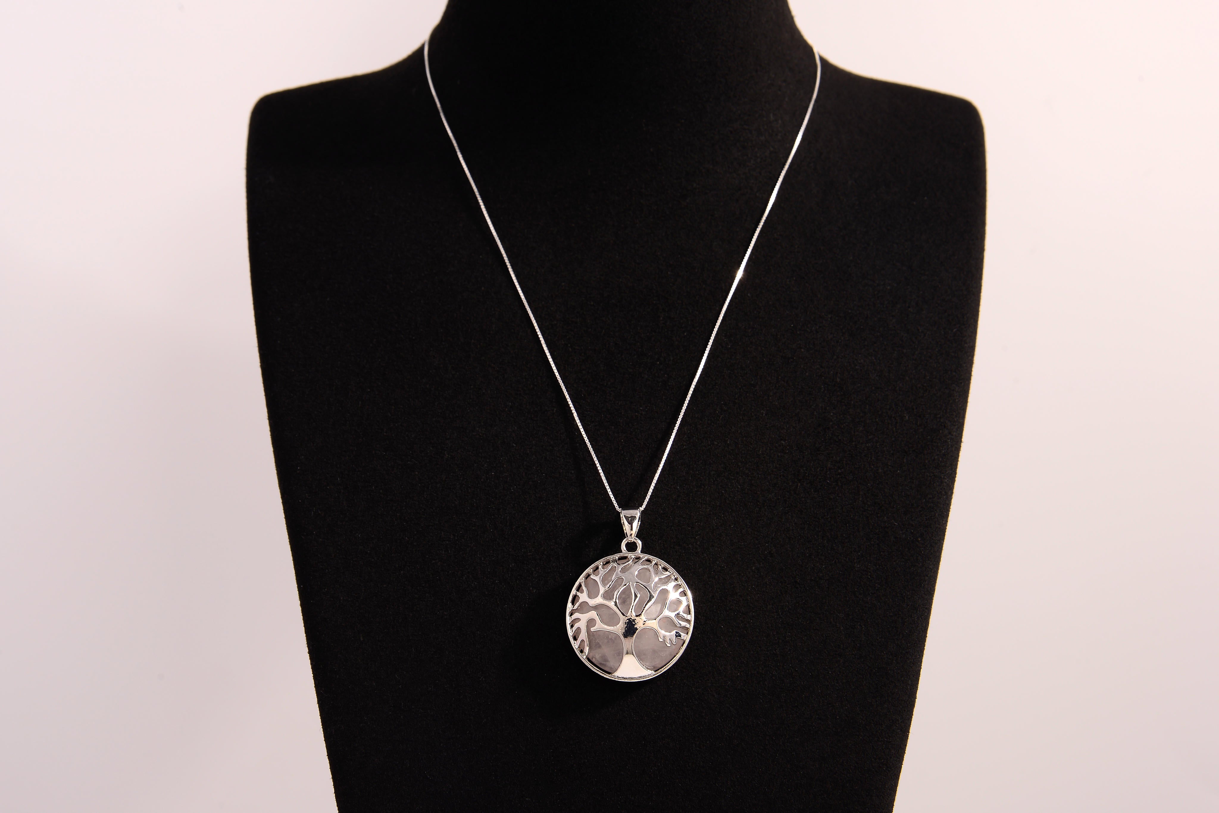 Raw Earth Crystals labradorite pendant featuring a tree of life design, crafted with natural crystal for protection, intuition, and inner strength.
