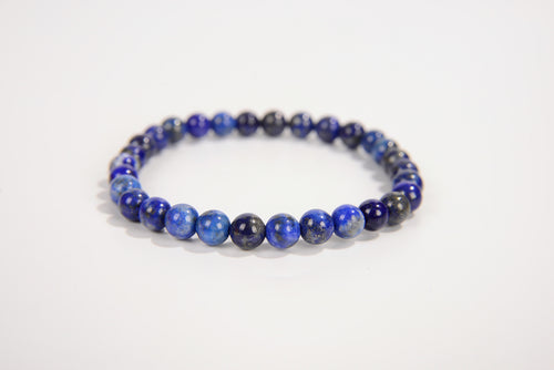 Lapis lazuli beaded bracelet from Raw Earth Crystals, featuring natural gemstones for wisdom, truth, and throat chakra balance.