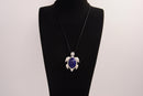Raw Earth Crystals lapis lazuli turtle necklace crafted from natural stone to enhance wisdom, truth, and inner clarity with calming energy.