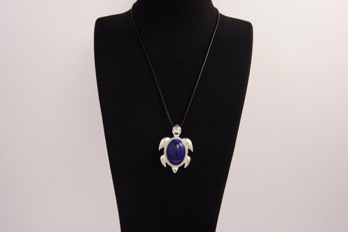 Raw Earth Crystals lapis lazuli turtle necklace crafted from natural stone to enhance wisdom, truth, and inner clarity with calming energy.