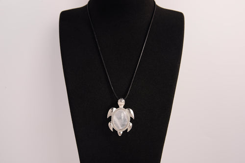 Raw Earth Crystals moonstone turtle necklace crafted from natural crystal to support intuition, emotional balance, and inner calm.