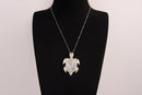 Raw Earth Crystals moonstone turtle necklace crafted from natural crystal to support intuition, emotional balance, and inner calm.