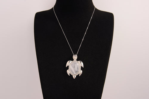 Raw Earth Crystals moonstone turtle necklace crafted from natural crystal to support intuition, emotional balance, and inner calm.