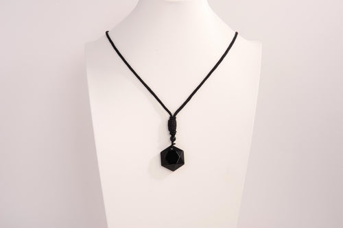 Raw Earth Crystals obsidian geometric pendant necklace crafted from natural crystal for protection, spiritual grounding, and inner clarity.