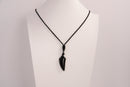Raw Earth Crystals obsidian point pendant necklace featuring natural crystal jewelry designed for protection, grounding, and emotional healing.