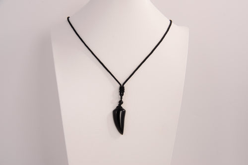 Raw Earth Crystals obsidian point pendant necklace featuring natural crystal jewelry designed for protection, grounding, and emotional healing.