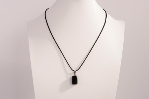 Raw Earth Crystals obsidian rectangle pendant necklace featuring natural crystal jewelry designed for protection, grounding, and emotional clarity.