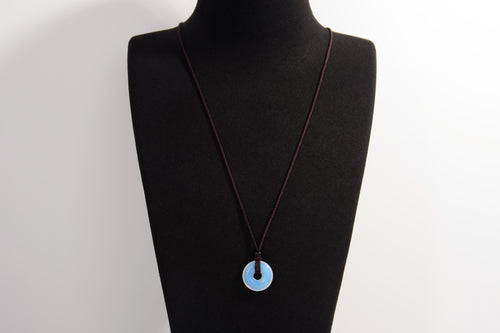 Raw Earth Crystals opalite disc pendant necklace made with natural crystal for emotional healing, clarity, and spiritual connection.