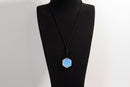 Raw Earth Crystals opalite geometric pendant necklace crafted from natural crystal for emotional healing, intuition, and inner peace.