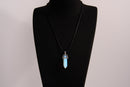 Raw Earth Crystals opalite necklace with a pointed natural stone pendant, designed to promote emotional balance, enhance clarity, and support spiritual awareness.