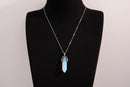 Raw Earth Crystals opalite necklace featuring a pointed natural stone pendant, designed to enhance emotional balance, promote clarity, and support spiritual connection.
