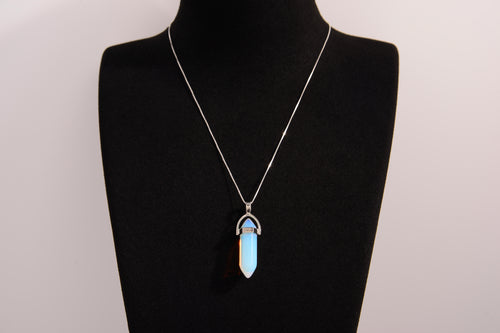Raw Earth Crystals opalite necklace featuring a pointed natural stone pendant, designed to enhance emotional balance, promote clarity, and support spiritual connection.