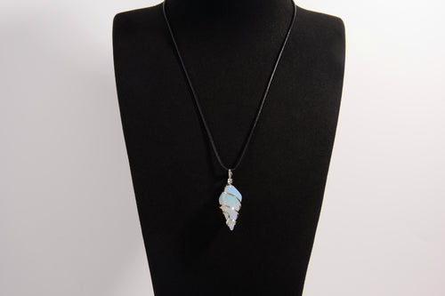 Raw Earth Crystals opalite pendant with a spiral wire wrap design, crafted from natural stone to promote emotional balance, calmness, and inner peace.