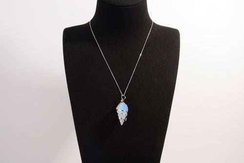 Raw Earth Crystals opalite pendant with a spiral wire wrap design, crafted from natural stone to promote emotional balance, calmness, and inner peace.