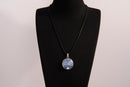 Raw Earth Crystals opalite pendant featuring a tree of life design, crafted with natural crystal for emotional healing, calmness, and spiritual growth.